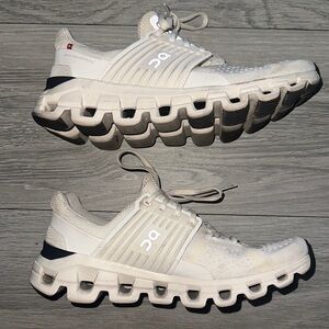 On Running Cream and White Sneakers